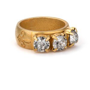 Elegant Gold Triple Stone Ring